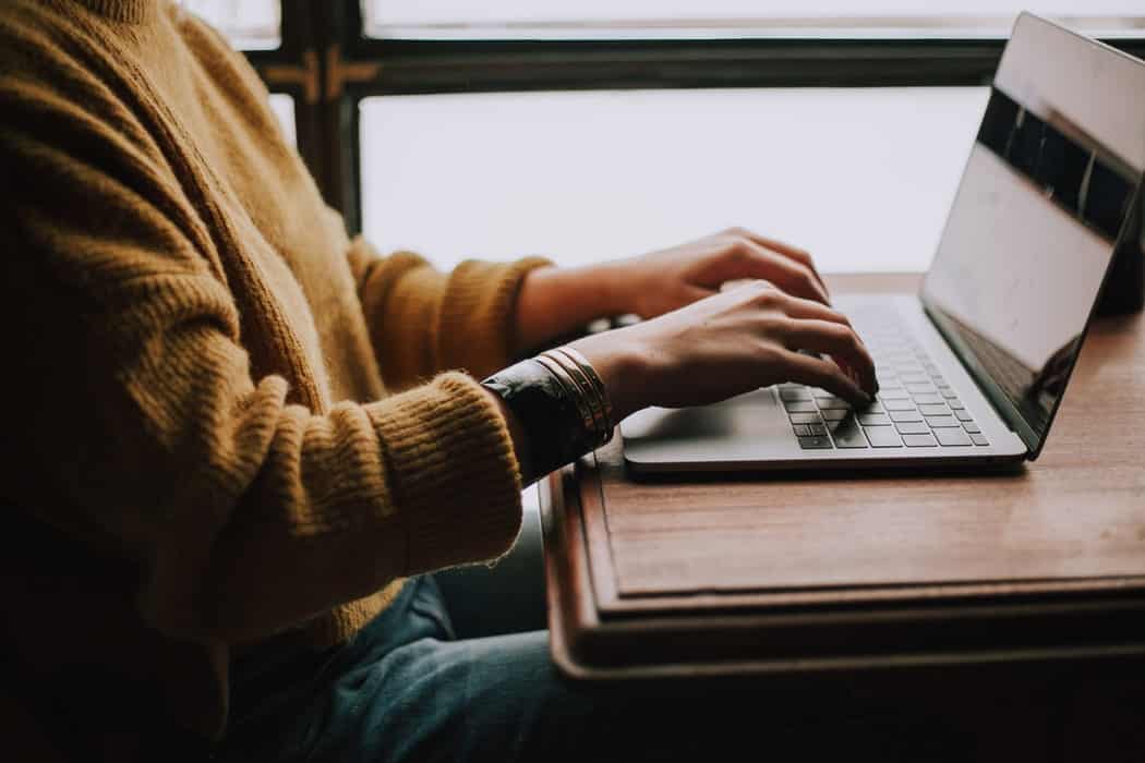 person working on lap top